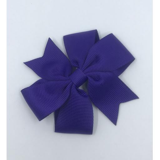 Small Purple Pinwheel (Coat tail) Bow on clip 3 inch