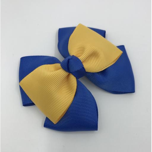Royal Blue Double Layer Bow with Yellow Gold Single Top Layer and Top Knot on Clip